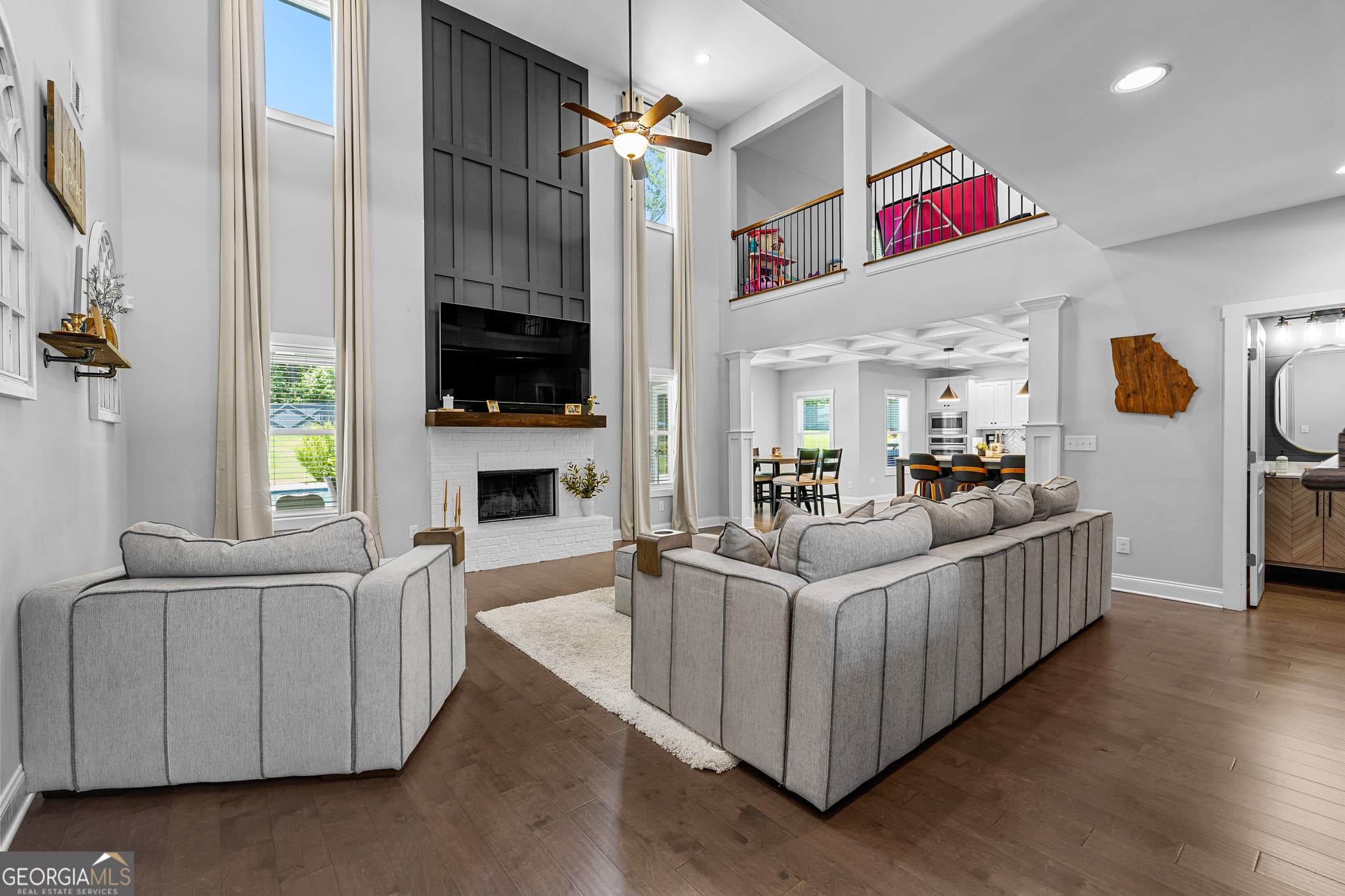 5 bedroom, 4 bathroom, 6,128 sq ft single family residence for sale at 878 McIntosh Trail, Sharpsburg, GA 30277 — photo 9