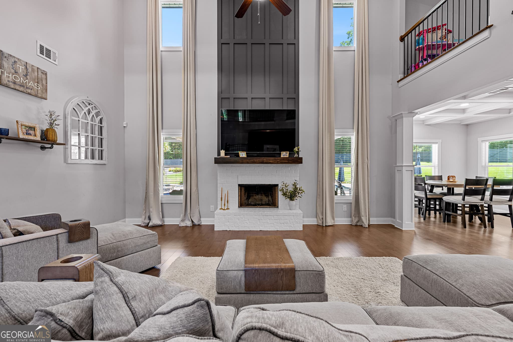 5 bedroom, 4 bathroom, 6,128 sq ft single family residence for sale at 878 McIntosh Trail, Sharpsburg, GA 30277 — photo 10
