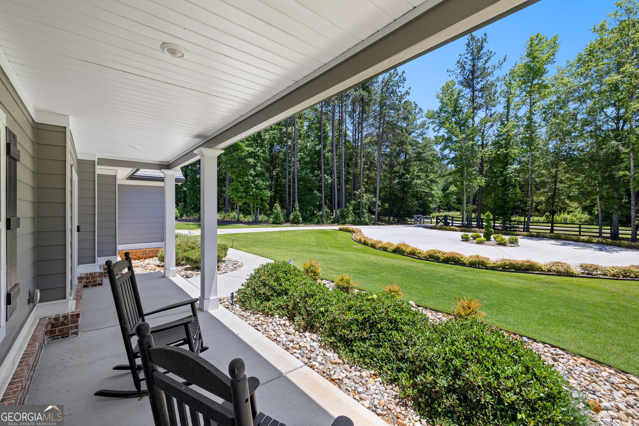 5 bedroom, 4 bathroom, 6,128 sq ft single family residence for sale at 878 McIntosh Trail, Sharpsburg, GA 30277 — photo 4