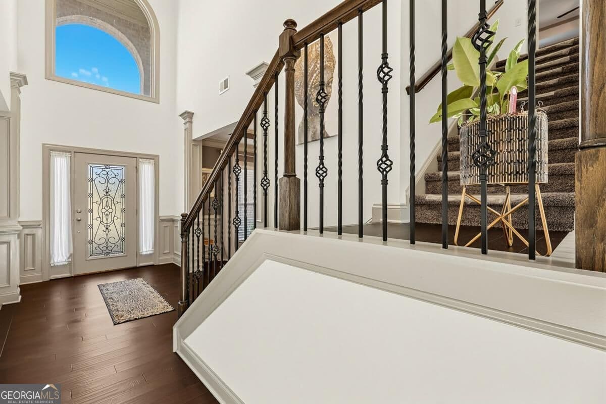 5 bedroom, 4 bathroom single family residence for sale at 7447 Winterberry Trace, Conyers, GA 30094 — photo 3