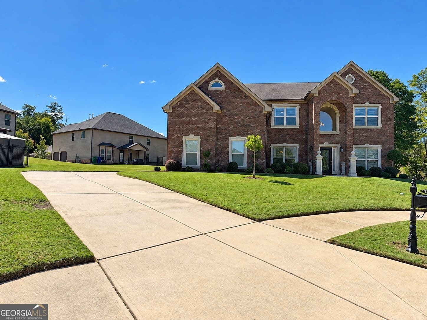 5 bedroom, 4 bathroom single family residence for sale at 7447 Winterberry Trace, Conyers, GA 30094 — photo 1 of 31