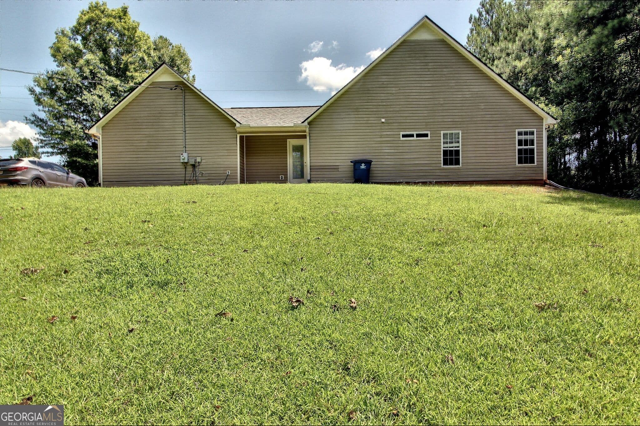 3 bedroom, 2 bathroom, 1,502 sq ft single family residence for sale at 5613 Hwy 81, Mcdonough, GA 30252 — photo 3