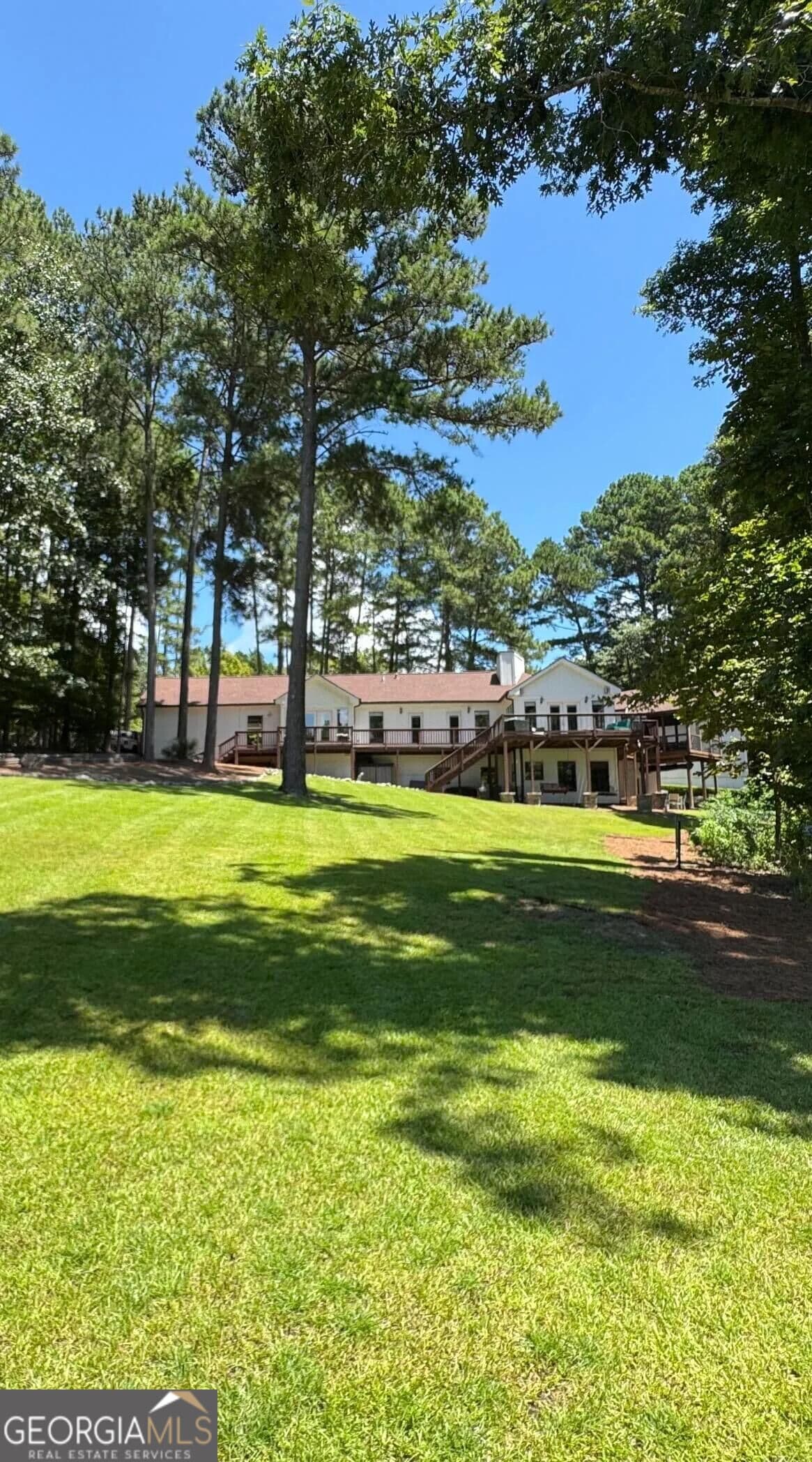 5 bedroom, 3.5 bathroom, 3,888 sq ft single family residence for sale at 117 Forest Ridge Circle, Eatonton, GA 31024 — photo 2