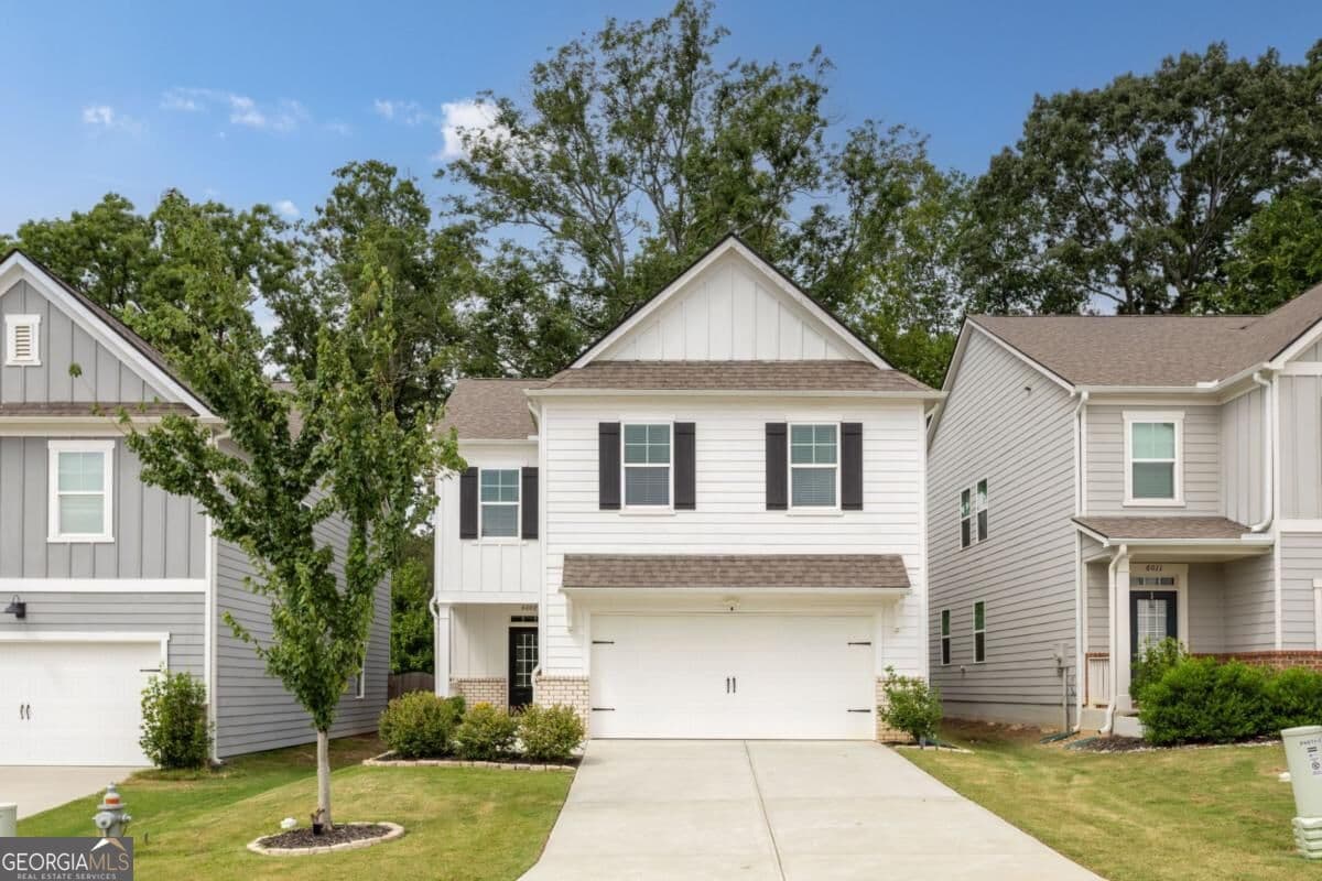 4 bedroom, 2.5 bathroom, 2,136 sq ft single family residence for sale at 6007 Hoot Owl Lane, Flowery Branch, GA 30542 — photo 1 of 34