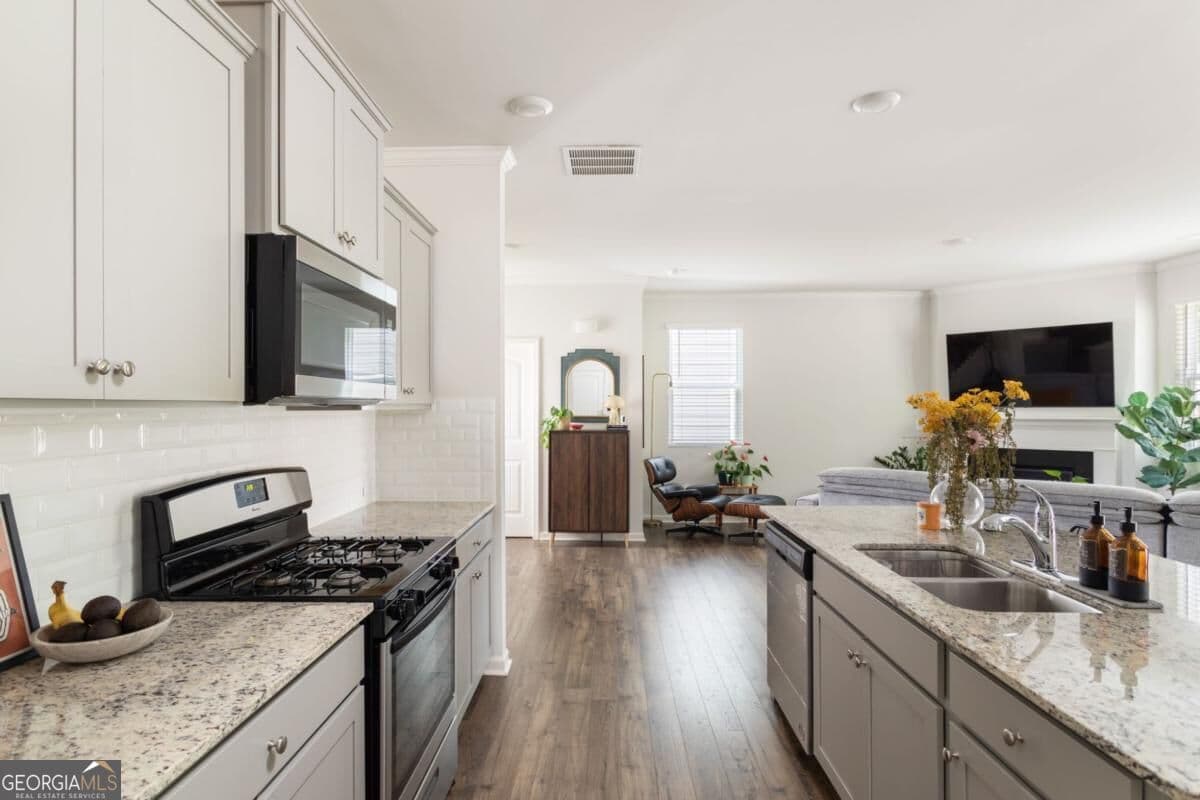 4 bedroom, 2.5 bathroom, 2,136 sq ft single family residence for sale at 6007 Hoot Owl Lane, Flowery Branch, GA 30542 — photo 10