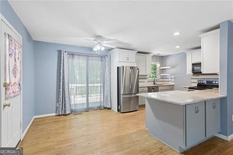 4 bedroom, 2 bathroom, 1,152 sq ft single family residence for sale at 31 Trina Avenue, Kennesaw, GA 30144 — photo 6