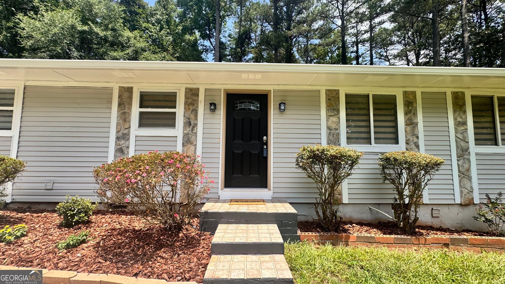 4 bedroom, 3 bathroom, 1,456 sq ft single family residence for sale at 4091 Big Valley Trail, Stone Mountain, GA 30083 — photo 3