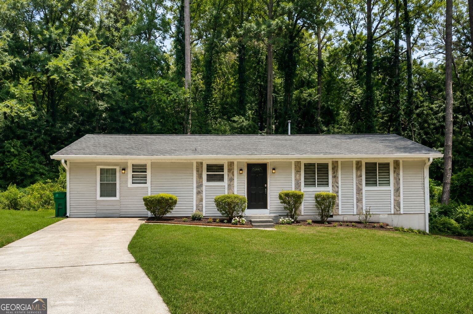 4 bedroom, 3 bathroom, 1,456 sq ft single family residence for sale at 4091 Big Valley Trail, Stone Mountain, GA 30083