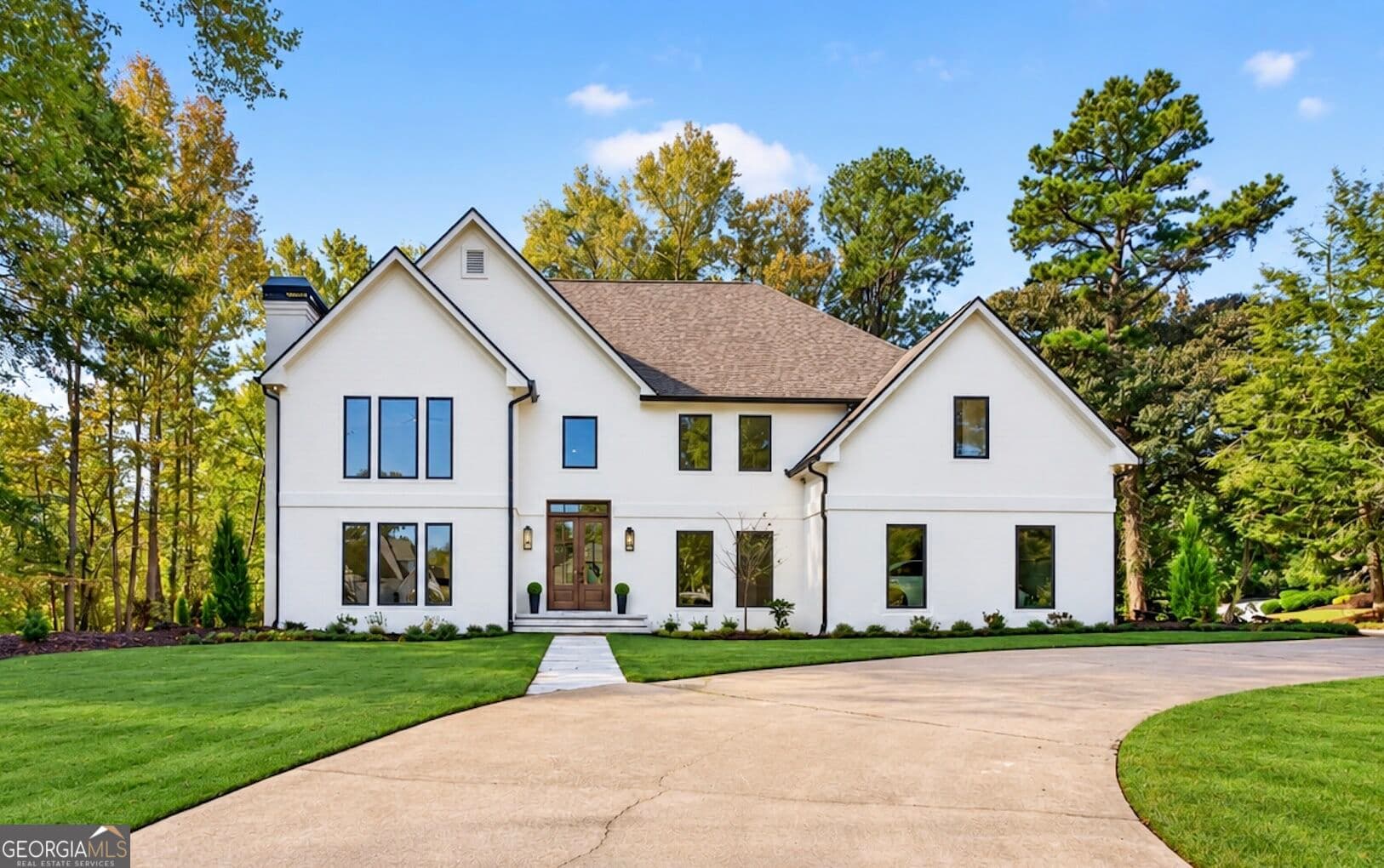 4 bedroom, 4.5 bathroom, 5,080 sq ft single family residence for sale at 9290 Prestwick Club Drive, Johns Creek, GA 30097