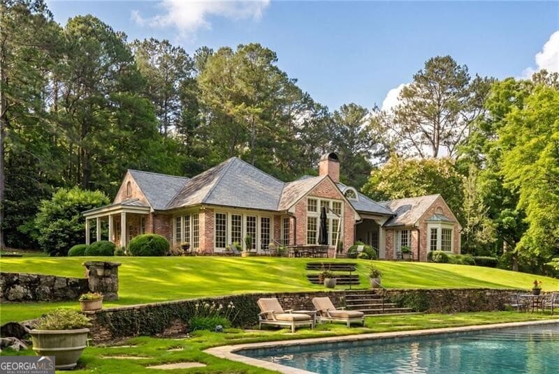 6 bedroom, 5 bathroom, 6,327 sq ft single family residence for sale at 10180 Capps Ferry Road, Chattahoochee Hills, GA 30268 — photo 3