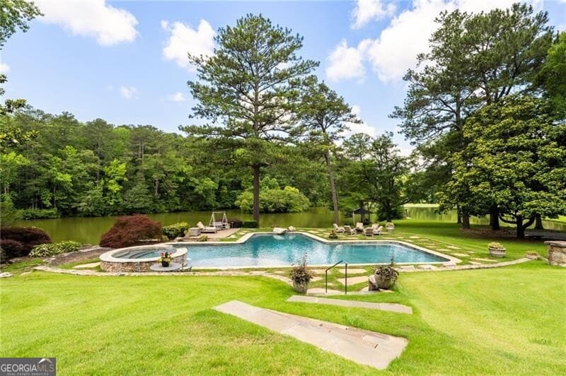 6 bedroom, 5 bathroom, 6,327 sq ft single family residence for sale at 10180 Capps Ferry Road, Chattahoochee Hills, GA 30268 — photo 5