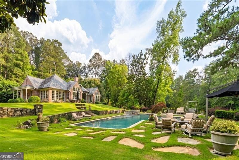 6 bedroom, 5 bathroom, 6,327 sq ft single family residence for sale at 10180 Capps Ferry Road, Chattahoochee Hills, GA 30268 — photo 4