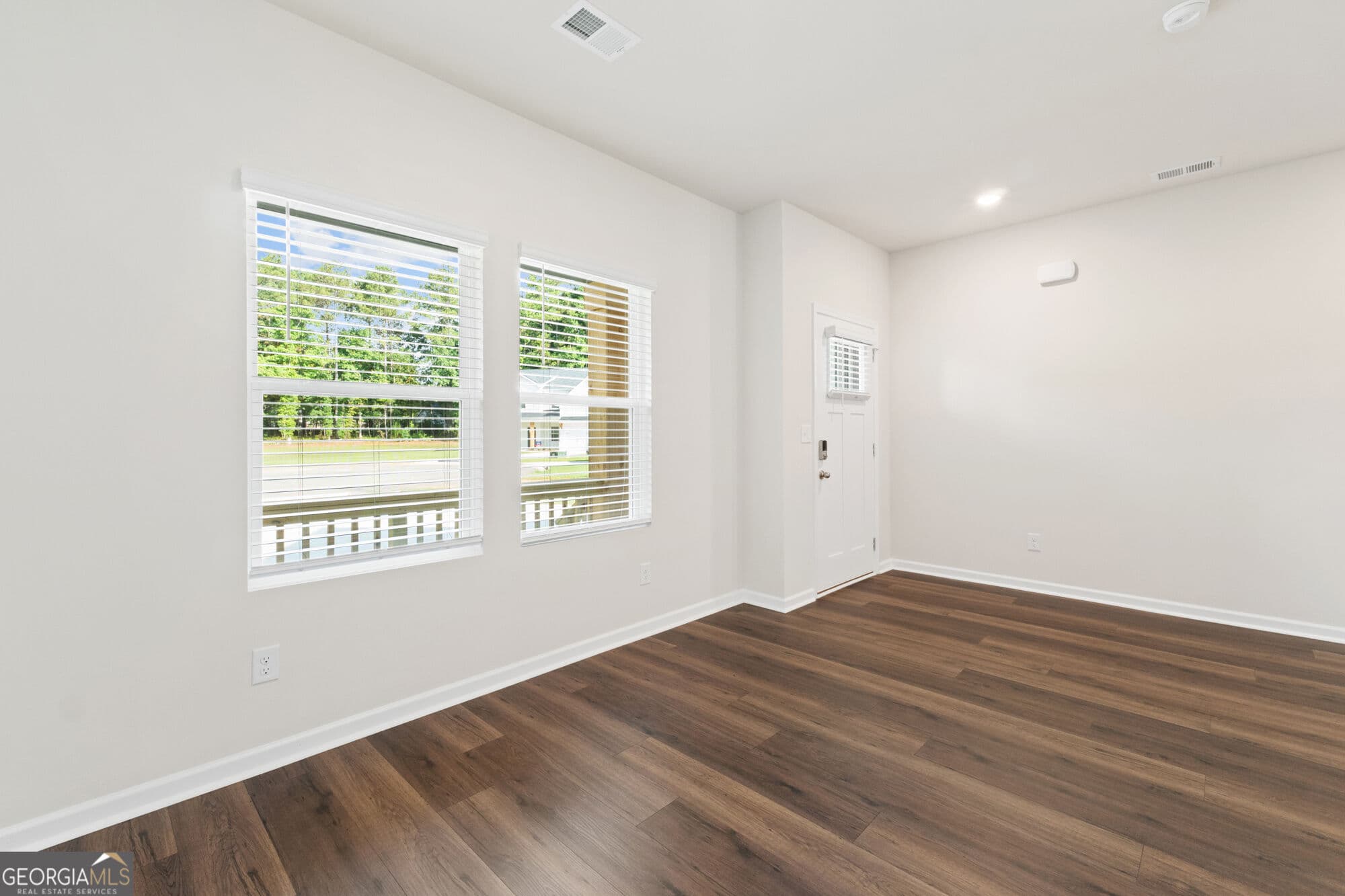 4 bedroom, 3 bathroom, 2,500 sq ft single family residence for sale at 1861 Millstone Manor, Conyers, GA 30013 — photo 3