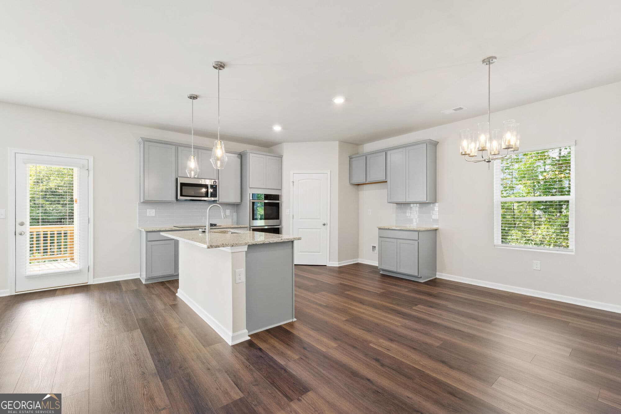 4 bedroom, 3 bathroom, 2,500 sq ft single family residence for sale at 1861 Millstone Manor, Conyers, GA 30013 — photo 4
