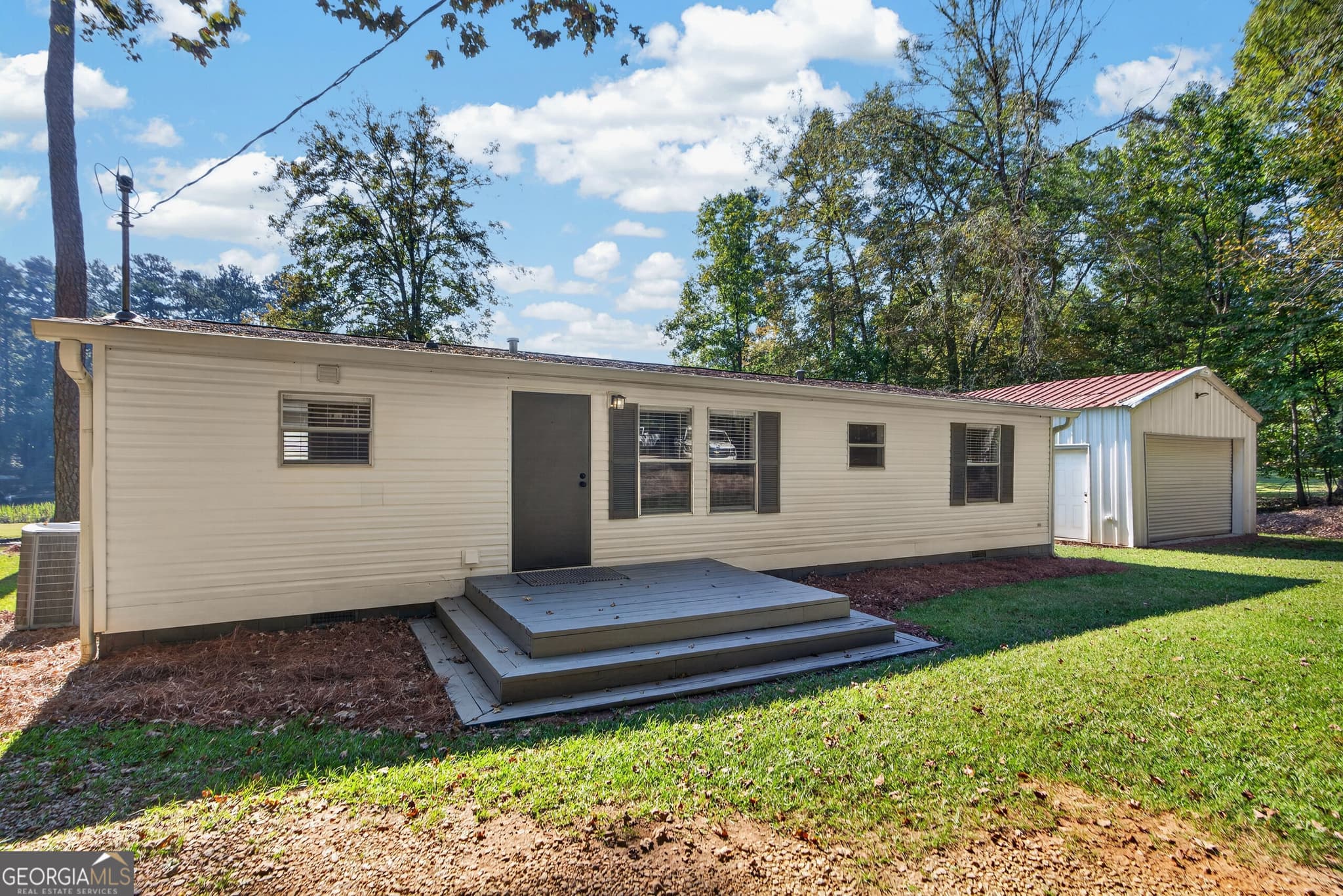 3 bedroom, 2 bathroom, 1,144 sq ft manufactured home,single family residence for sale at 182 De Jarnette Road, Eatonton, GA 31024 — photo 6