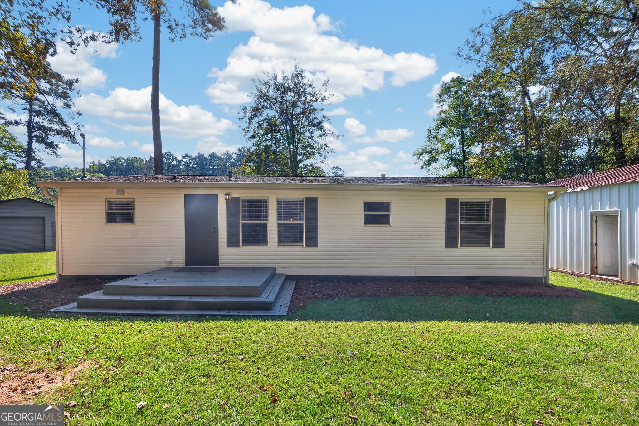 3 bedroom, 2 bathroom, 1,144 sq ft manufactured home,single family residence for sale at 182 De Jarnette Road, Eatonton, GA 31024 — photo 4