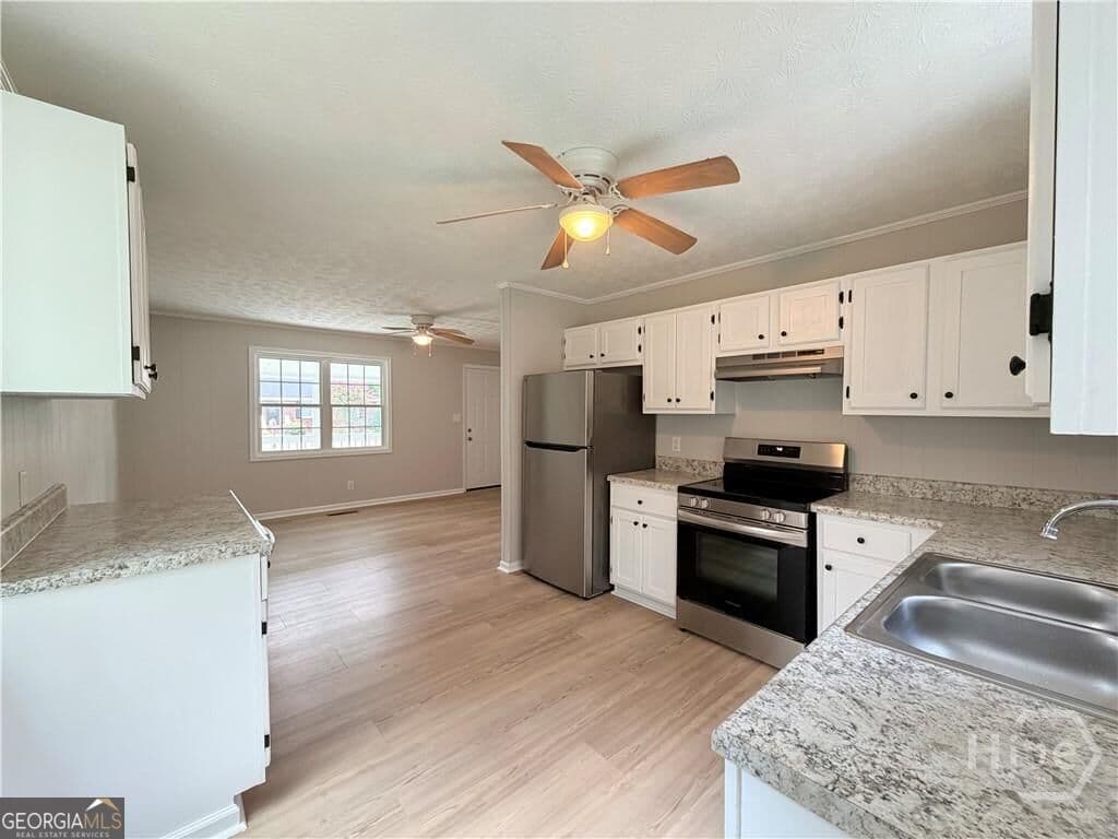 4 bedroom, 2 bathroom, 1,440 sq ft single family residence for rent at 1282 Kesler Road, Winder, GA 30680 for $1,750 a month — photo 2