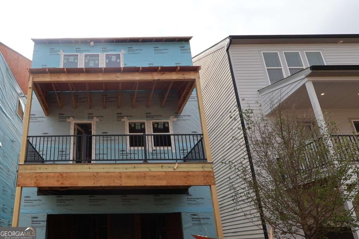 4 bedroom, 3.5 bathroom, 2,265 sq ft single family residence for sale at 799 Auguste Avenue, Scottdale, GA 30079 — photo 2