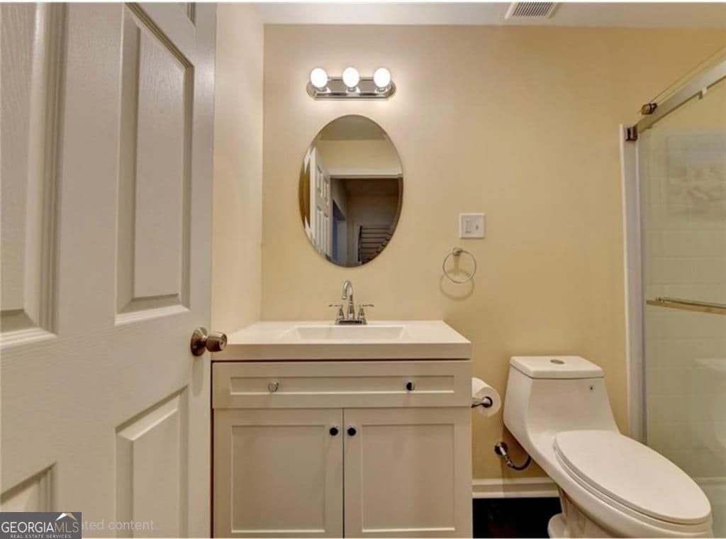 5 bedroom, 3.5 bathroom, 3,499 sq ft single family residence for sale at 1376 Castleberry Drive, Buford, GA 30518 — photo 10