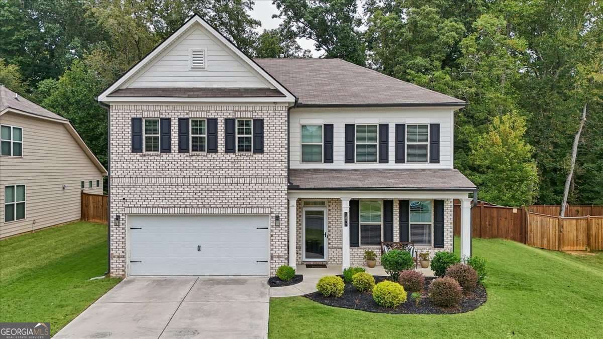 4 bedroom, 3 bathroom single family residence for sale at 1877 Hanwoo Lane, Powder Springs, GA 30127 — photo 2