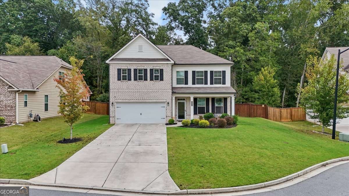 4 bedroom, 3 bathroom single family residence for sale at 1877 Hanwoo Lane, Powder Springs, GA 30127 — photo 6