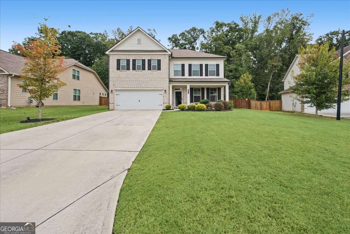 4 bedroom, 3 bathroom single family residence for sale at 1877 Hanwoo Lane, Powder Springs, GA 30127 — photo 3