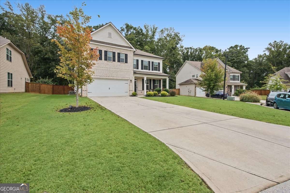 4 bedroom, 3 bathroom single family residence for sale at 1877 Hanwoo Lane, Powder Springs, GA 30127 — photo 5