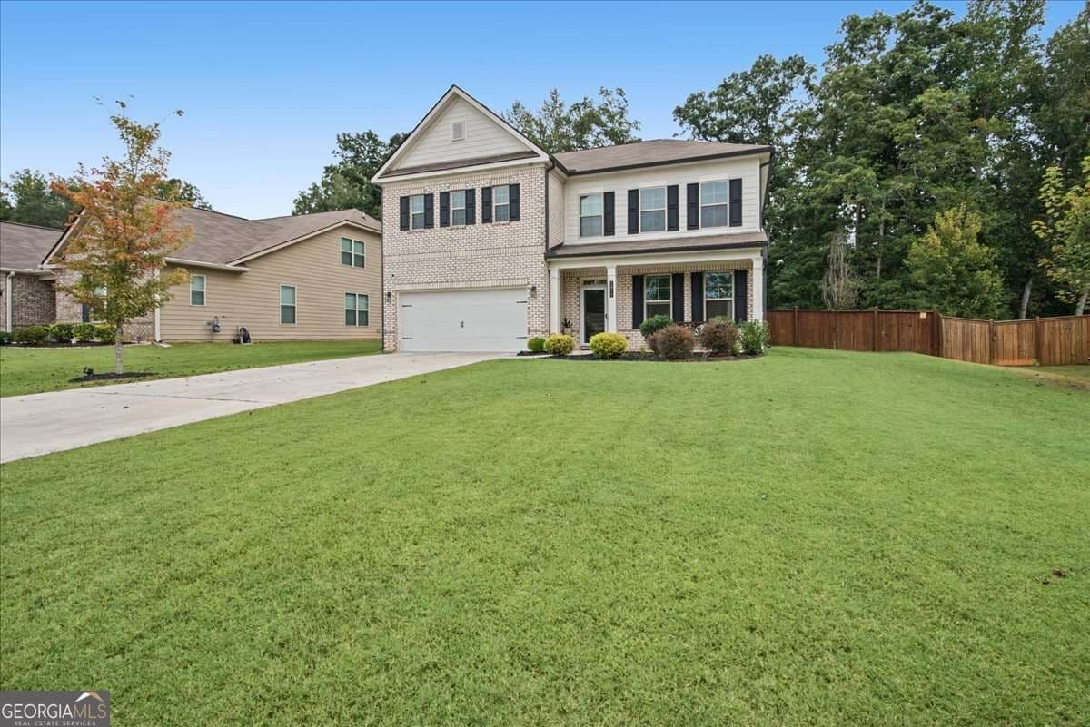 4 bedroom, 3 bathroom single family residence for sale at 1877 Hanwoo Lane, Powder Springs, GA 30127 — photo 4