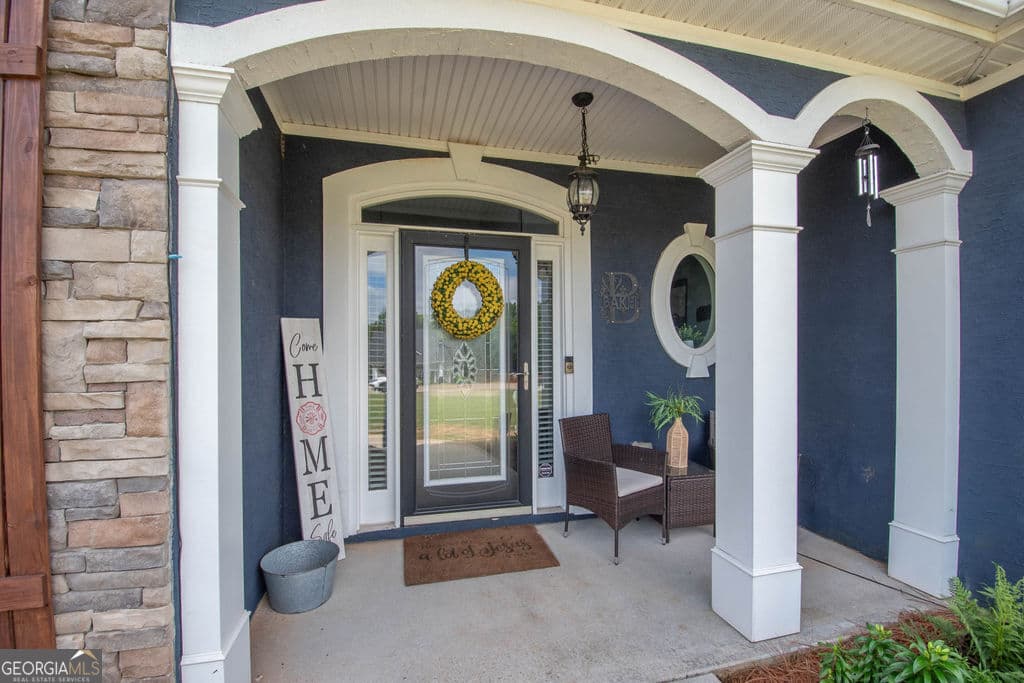 5 bedroom, 3.5 bathroom, 2,647 sq ft single family residence for sale at 128 Windsor Court, Williamson, GA 30292 — photo 3