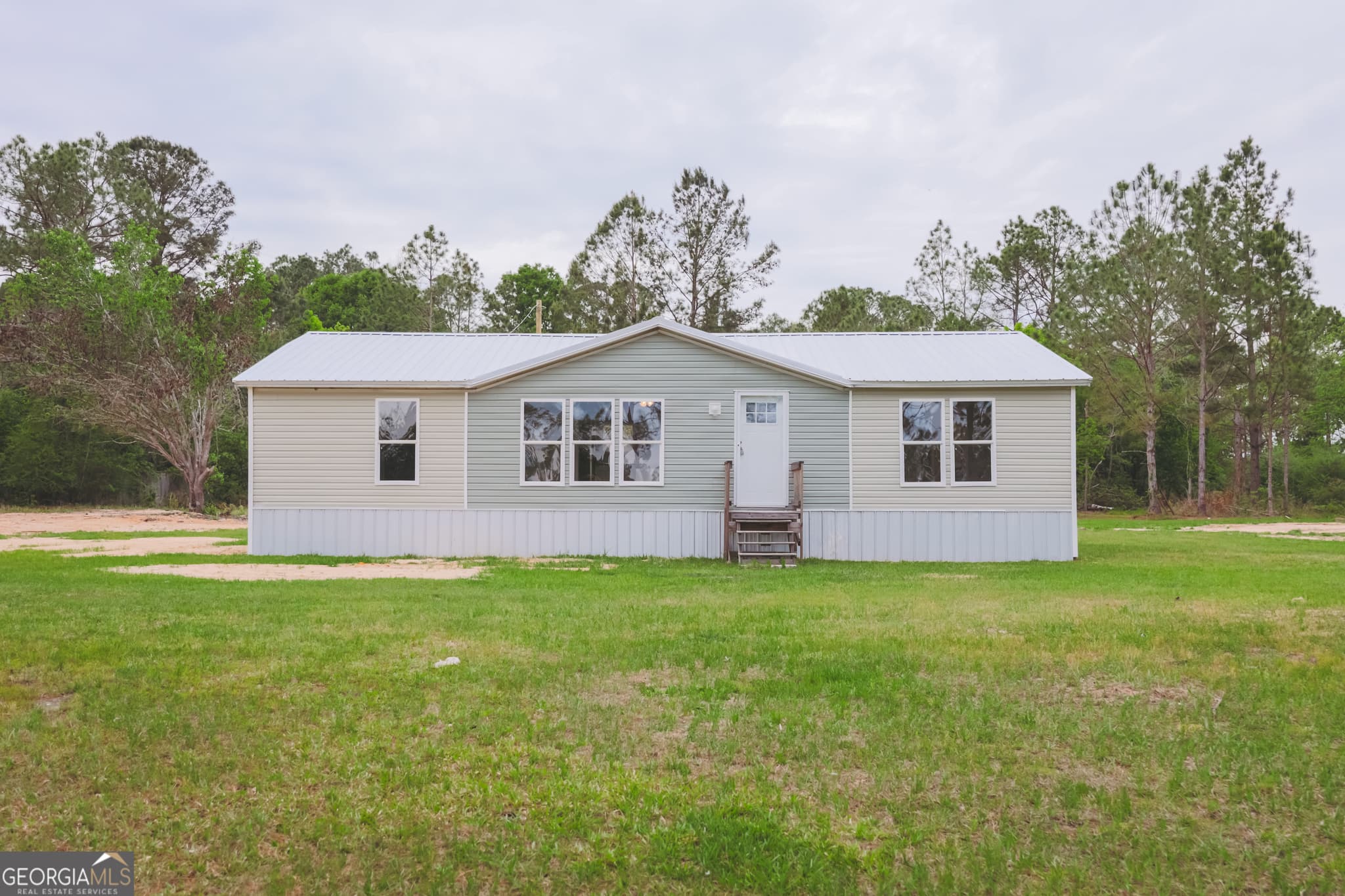 3 bedroom, 2 bathroom, 1,500 sq ft manufactured home,single family residence sold at 512 Bennett Still Highway, Alma, GA 31510