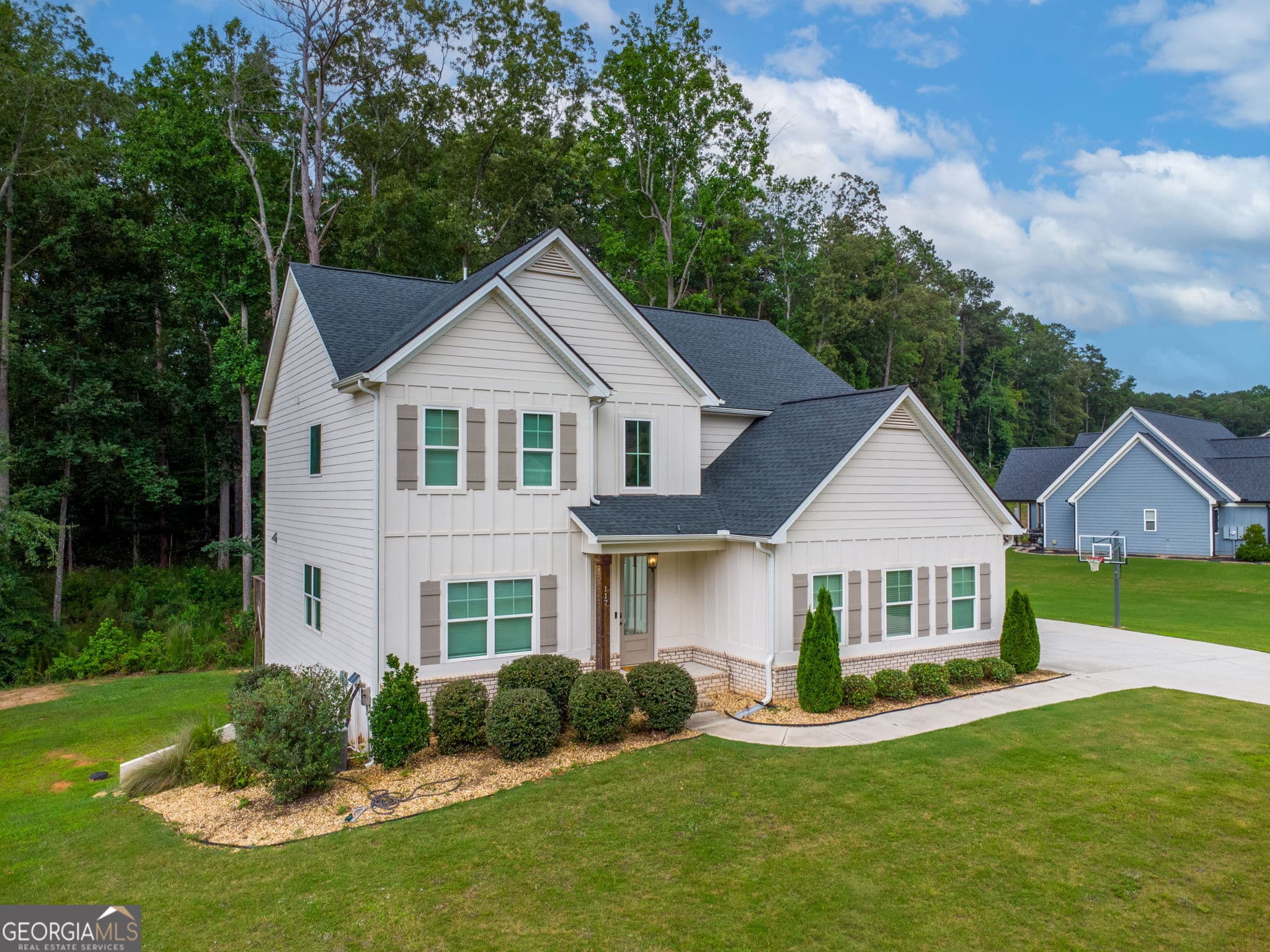 5 bedroom, 3 bathroom, 2,769 sq ft single family residence for sale at 117 Brinley Drive, Sharpsburg, GA 30277 — photo 2