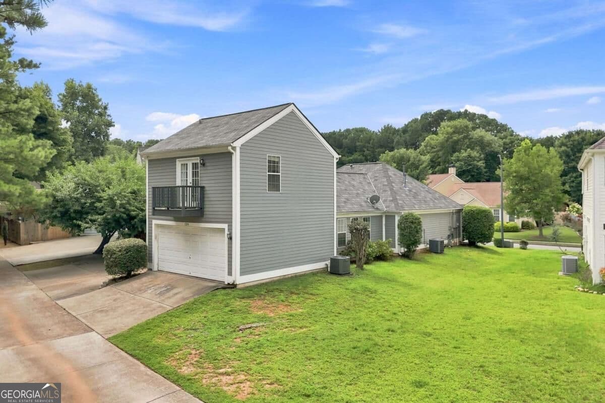 4 bedroom, 3 bathroom single family residence for sale at 124 Ivygreen Chase, Canton, GA 30114 — photo 3