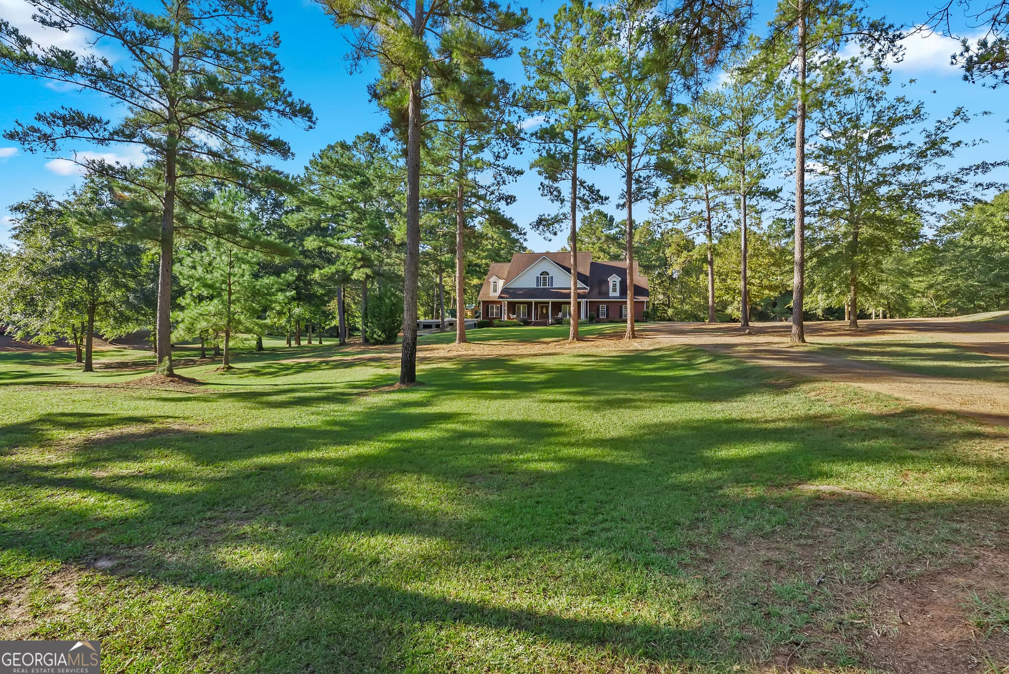 7 bedroom, 5 bathroom, 5,625 sq ft single family residence for sale at 490 Middle River Road, Americus, GA 31709 — photo 2