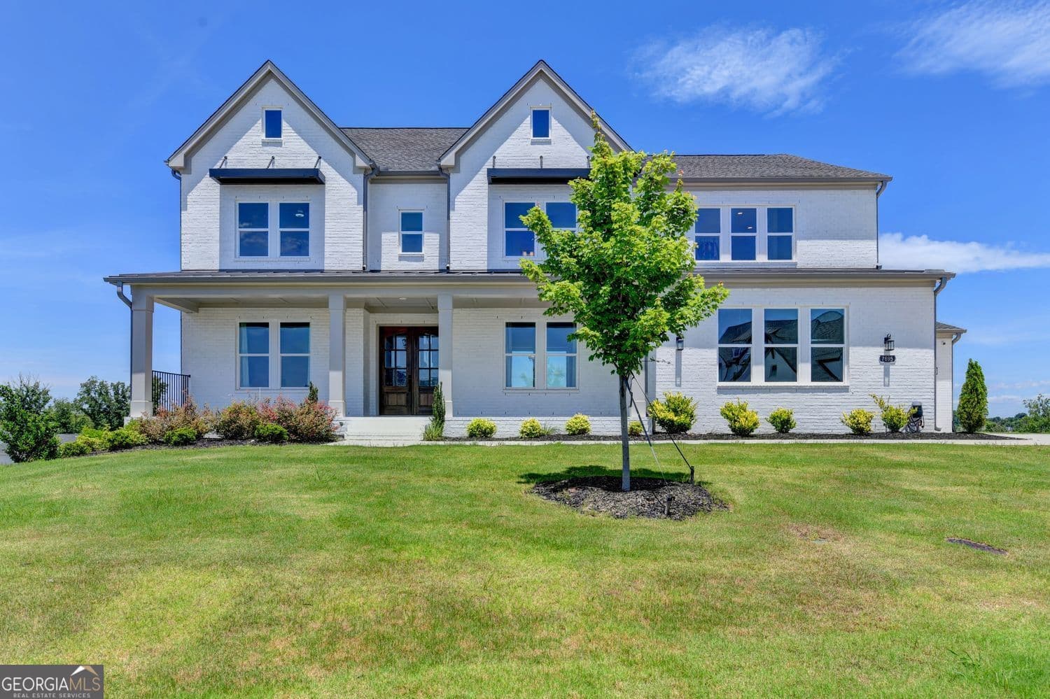 5 bedroom, 5.5 bathroom, 5,020 sq ft single family residence sold at 7695 Poppy Mill Lane, Cumming, GA 30040