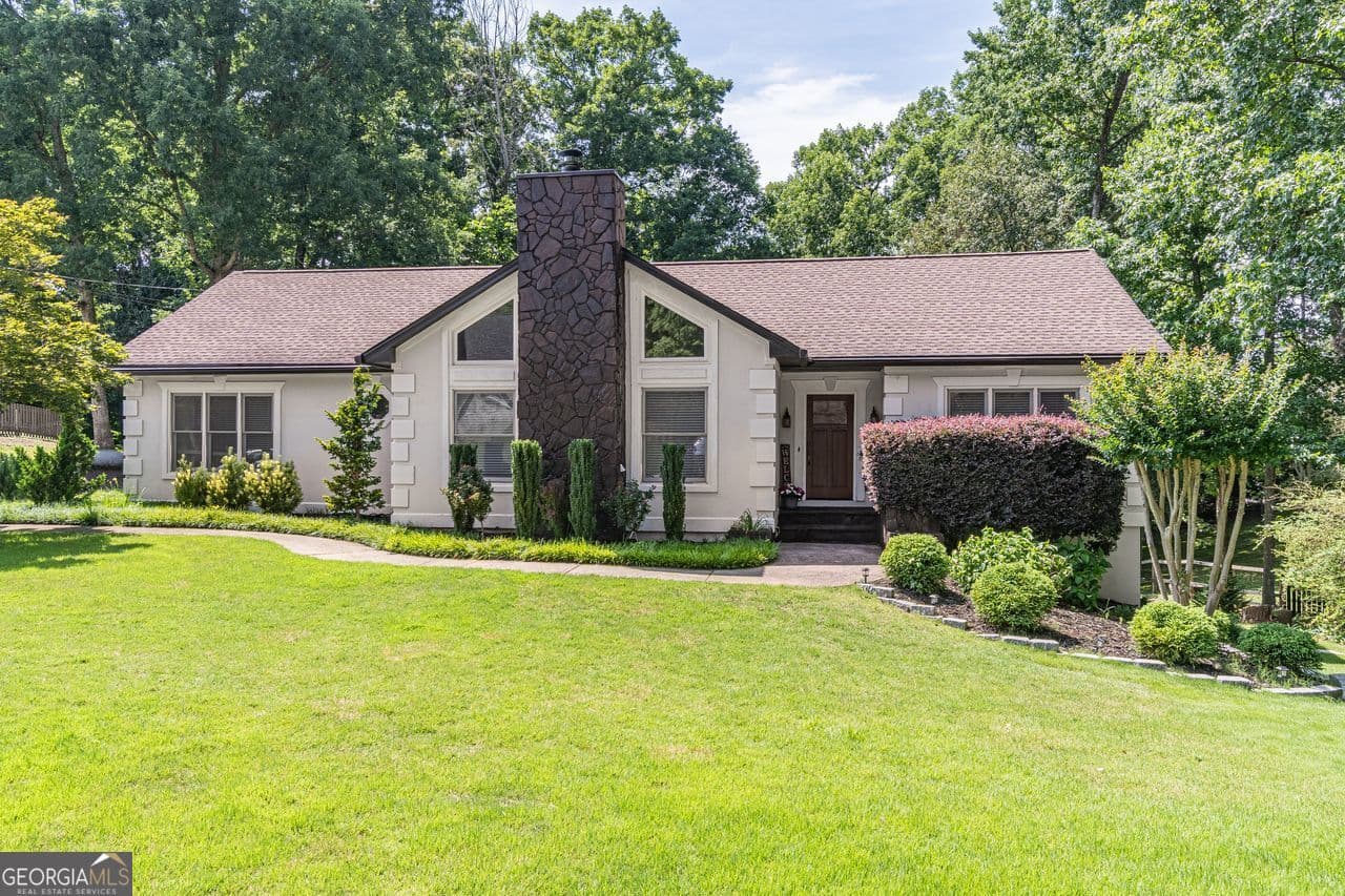 3 bedroom, 2 bathroom, 1,770 sq ft single family residence sold at 5050 Puritan Drive, Sugar Hill, GA 30518