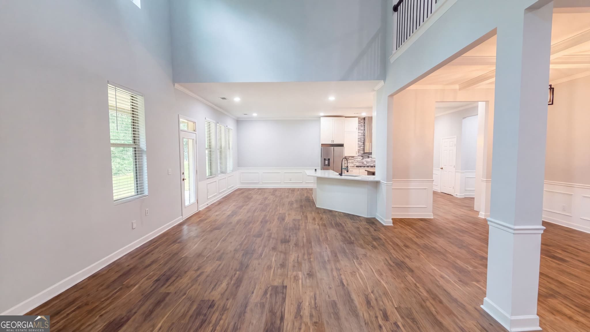 6 bedroom, 4.5 bathroom, 4,879 sq ft single family residence for sale at 321 Basel Way, Hampton, GA 30228 — photo 3