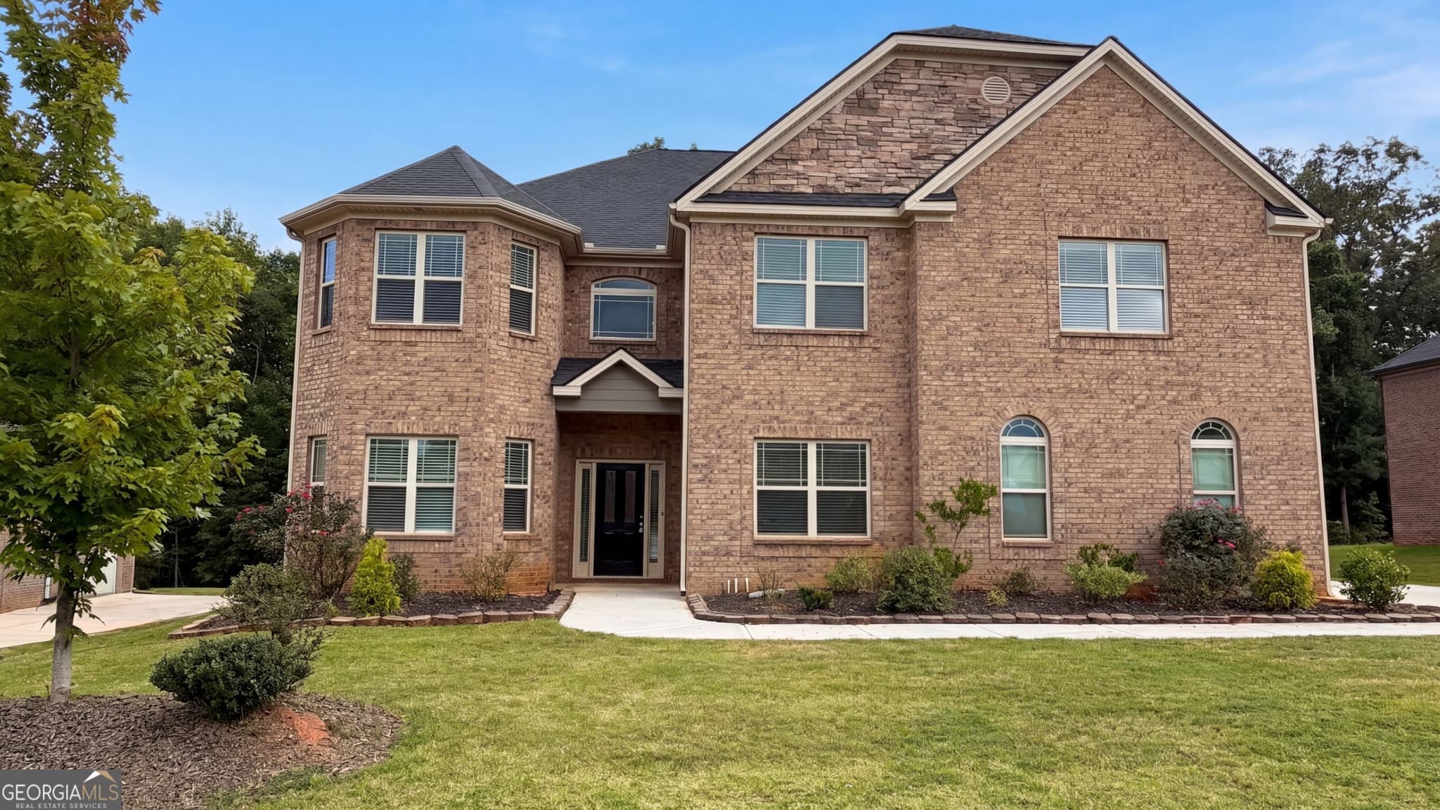 6 bedroom, 4.5 bathroom, 4,879 sq ft single family residence for sale at 321 Basel Way, Hampton, GA 30228