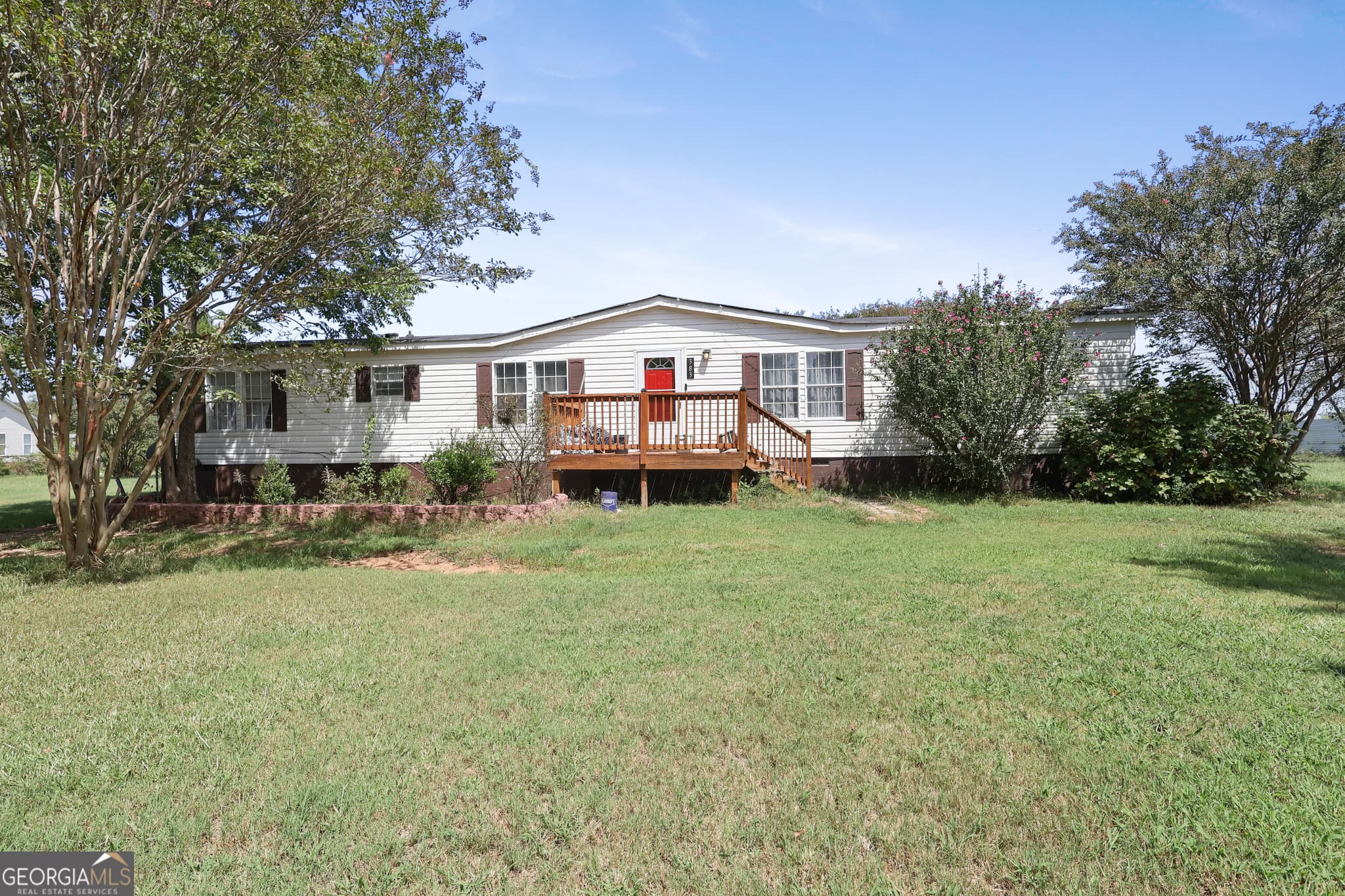 4 bedroom, 2 bathroom, 1,887 sq ft single family residence for sale at 383 Jones Road, Milner, GA 30257 — photo 2