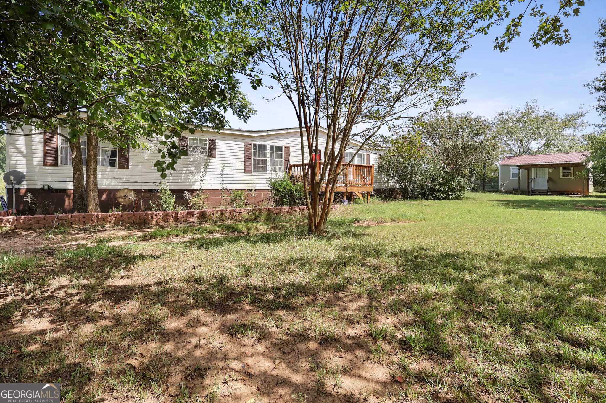 4 bedroom, 2 bathroom, 1,887 sq ft single family residence for sale at 383 Jones Road, Milner, GA 30257 — photo 3