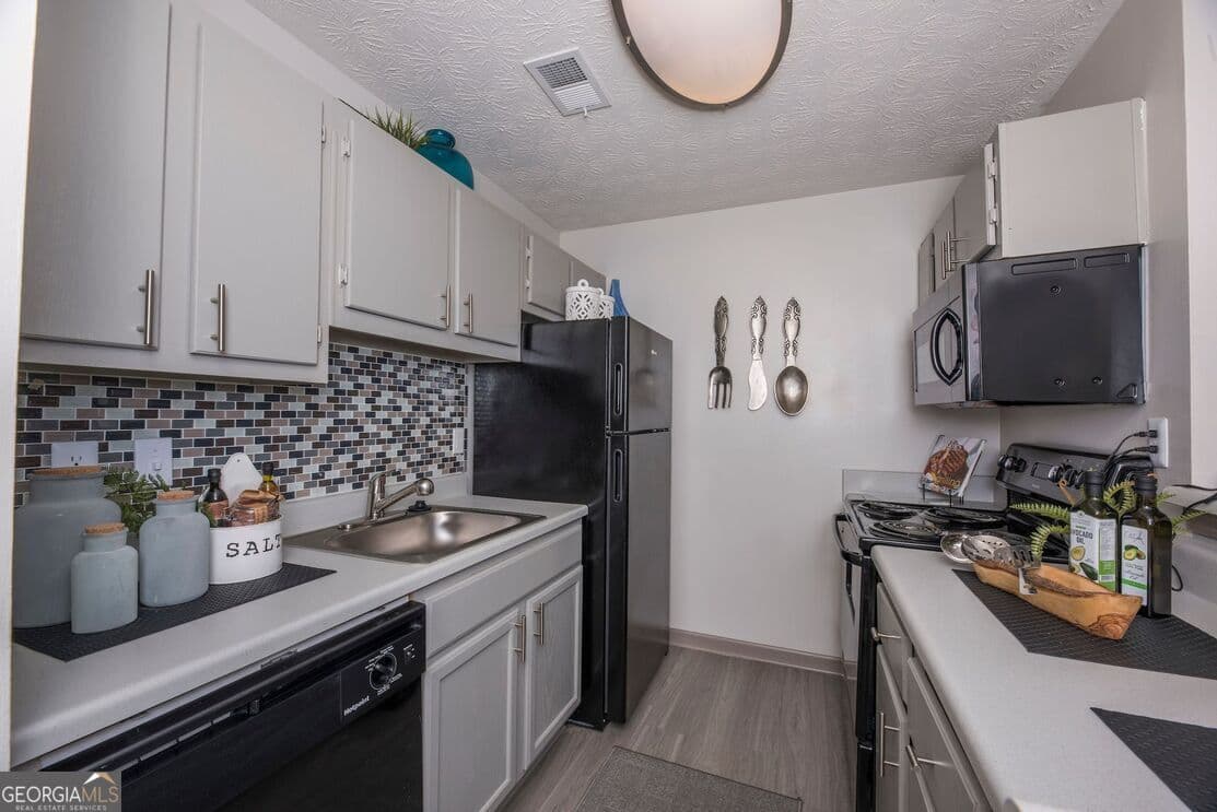 2 bedroom, 2 bathroom, 1,036 sq ft apartment for rent at 1000 Lake Ridge Parkway 1208, Riverdale, GA 30296 for $1,442 a month — photo 2