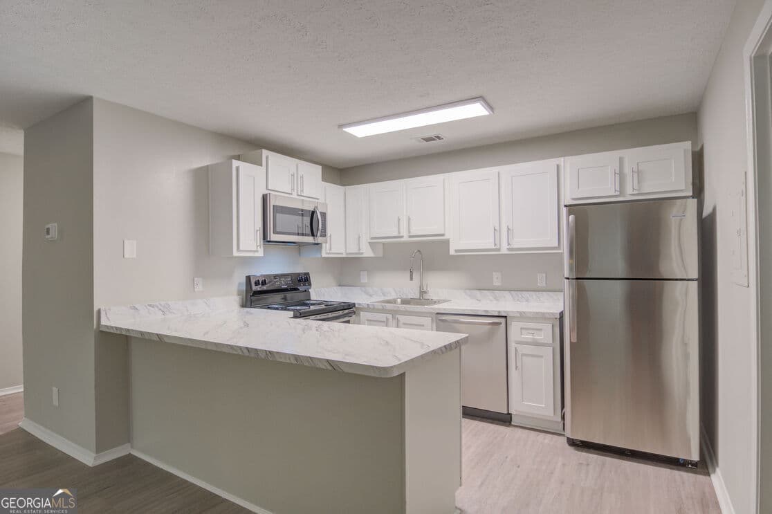 2 bedroom, 2 bathroom, 1,036 sq ft apartment for rent at 1000 Lake Ridge Parkway 1208, Riverdale, GA 30296 for $1,442 a month — photo 3