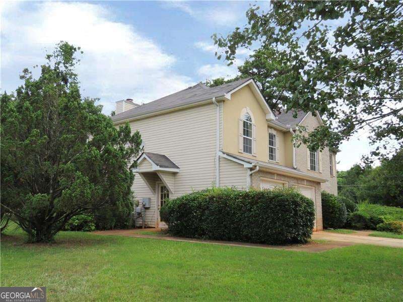 4 bedroom, 2.5 bathroom single family residence for sale at 4057 Stonington Trace, Ellenwood, GA 30294 — photo 2