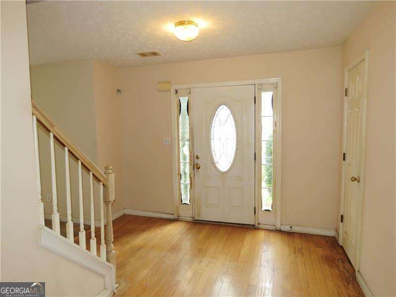 4 bedroom, 2.5 bathroom single family residence for sale at 4057 Stonington Trace, Ellenwood, GA 30294 — photo 6