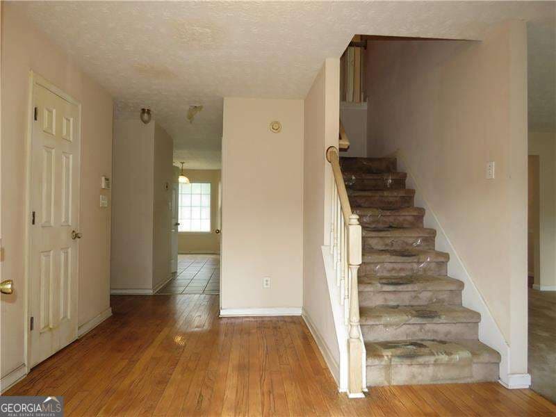 4 bedroom, 2.5 bathroom single family residence for sale at 4057 Stonington Trace, Ellenwood, GA 30294 — photo 7