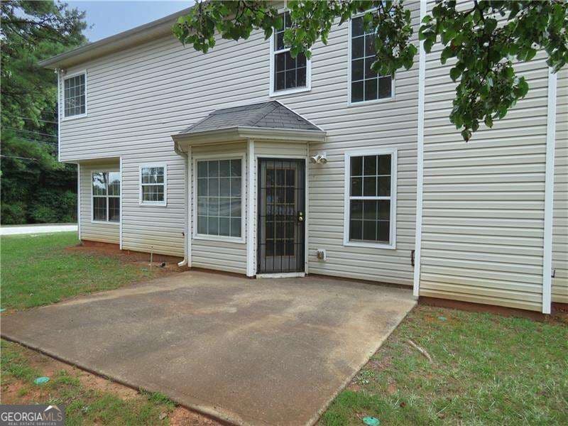 4 bedroom, 2.5 bathroom single family residence for sale at 4057 Stonington Trace, Ellenwood, GA 30294 — photo 3