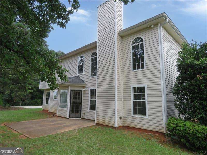 4 bedroom, 2.5 bathroom single family residence for sale at 4057 Stonington Trace, Ellenwood, GA 30294 — photo 4