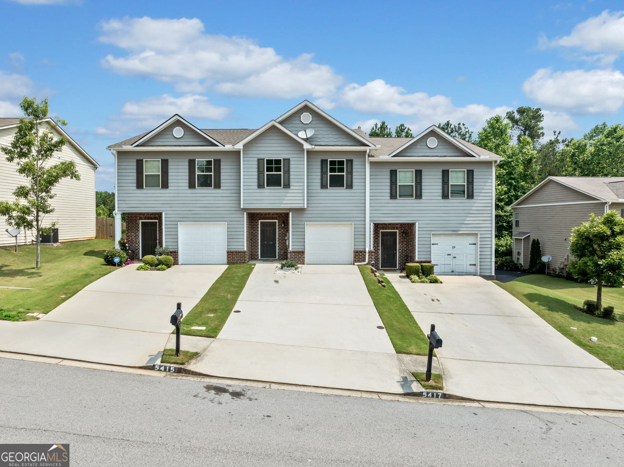 3 bedroom, 2.5 bathroom, 1,566 sq ft townhouse for sale at 5415 Sycamore Court, Oakwood, GA 30566 — photo 2