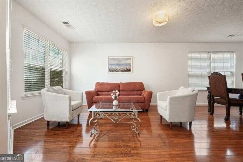 4 bedroom, 2.5 bathroom, 2,356 sq ft single family residence for sale at 115 Village Trace, Woodstock, GA 30188 — photo 2