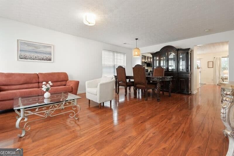 4 bedroom, 2.5 bathroom, 2,356 sq ft single family residence for sale at 115 Village Trace, Woodstock, GA 30188 — photo 6