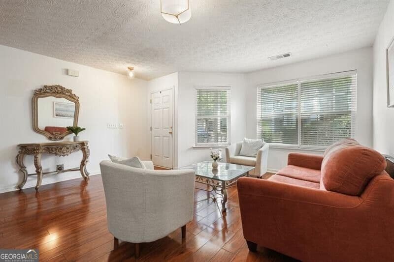 4 bedroom, 2.5 bathroom, 2,356 sq ft single family residence for sale at 115 Village Trace, Woodstock, GA 30188 — photo 3